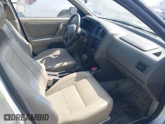 2002 Infiniti G20 Luxury z VIN JNKCP11A82T509291, wystawiony jako IAAI lot #42121305 z przebiegiem 147 256 mil mil oraz . Historia ofert i sprzedaży dostępna na DreamBid. Obrazek 5.