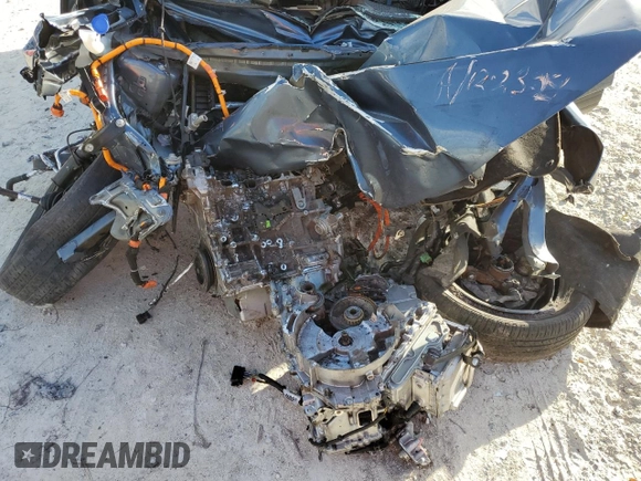 2020 Ford Escape Titanium Hybrid z VIN 1FMCU9DZ4LUC29367, wystawiony jako Copart lot #84709314 z przebiegiem Nie podano mil oraz Nie do naprawy • Non repairable. Historia ofert i sprzedaży dostępna na DreamBid. Obrazek 13.