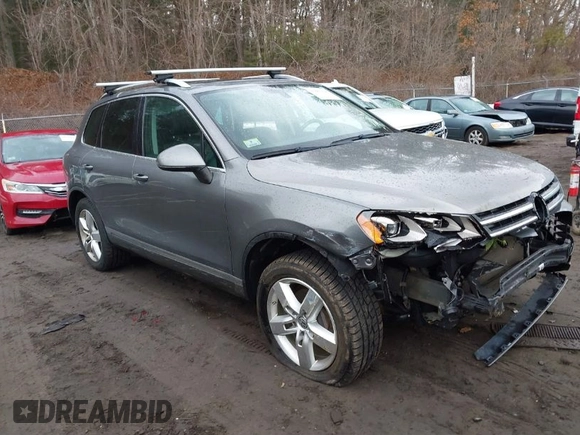 2013 Volkswagen Touareg Lux with VIN WVGEF9BP0DD005082, listed as a IAAI auction lot 41667026 with 140,148 mi miles and . Bid and sale history available at DreamBid. Image 1.