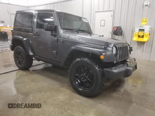 2017 Jeep Wrangler Willys Wheeler with VIN 1C4AJWAG9HL696710, listed as a Copart auction lot 88744905 with 66,800 mi miles and Salvage Title. Bid and sale history available at DreamBid. Image 4.