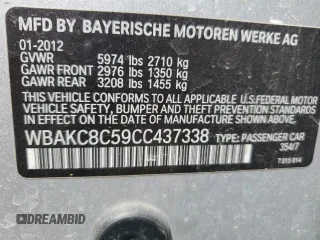 2012 BMW 7 Series 750Li xDrive z VIN WBAKC8C59CC437338, wystawiony jako Copart lot #52570505 z przebiegiem 152 146 mil mil oraz Tytuł czysty. Historia ofert i sprzedaży dostępna na DreamBid. Obrazek 12.