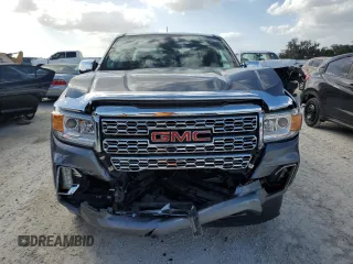 2021 GMC Canyon 4WD Denali with VIN 1GTG6EEN7M1281163, listed as a Copart auction lot 78996944 with 49,299 mi miles and Non Repairable. Bid and sale history available at carsss.com. Image 5.