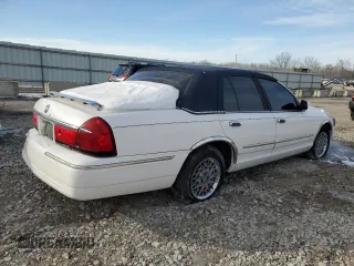 2001 Mercury Grand Marquis GS z VIN 2MEFM74W61X695639, wystawiony jako Copart lot #42099295 z przebiegiem 137 501 mil mil oraz Nie do naprawy • Non repairable. Historia ofert i sprzedaży dostępna na DreamBid. Obrazek 3.