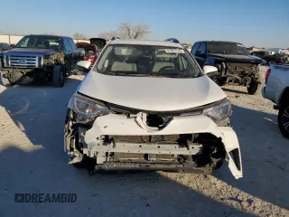 2018 Toyota RAV4 XLE with VIN JTMWFREV7JJ742974, listed as a Copart auction lot 41957735 with 87,005 mi miles and Salvage Title. Bid and sale history available at DreamBid. Image 5.
