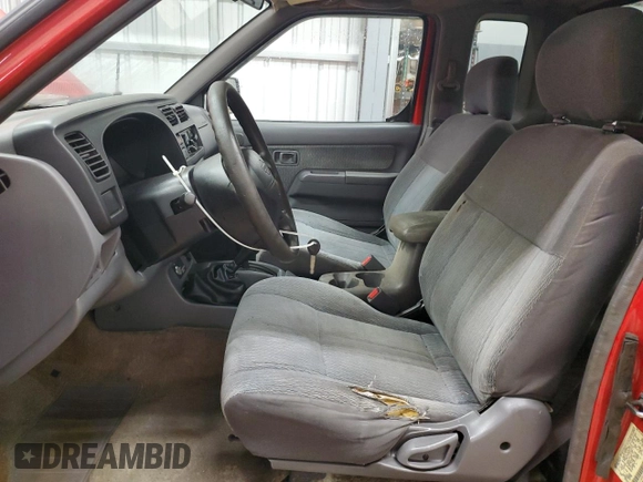 1999 Nissan Frontier XE with VIN 1N6ED26Y5XC308158, listed as a Copart auction lot 84320904 with 316,532 mi miles and Clean title. Bid and sale history available at DreamBid. Image 7.