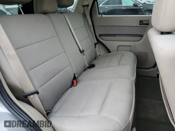 2012 Ford Escape XLT with VIN 1FMCU0D73CKA20143, listed as a Copart auction lot 63111075 with 136,942 mi miles and Salvage title. Bid and sale history available at DreamBid. Image 11.