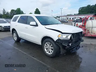 2015 Dodge Durango Special Service with VIN 1C4RDJFG7FC801778, listed as a IAAI auction lot 42450221 with 94,059 mi miles and . Bid and sale history available at DreamBid. Image 1.
