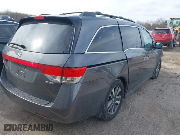 2016 Honda Odyssey Touring Elite z VIN 5FNRL5H99GB072860, wystawiony jako IAAI lot #42157603 z przebiegiem 221 449 mil mil oraz . Historia ofert i sprzedaży dostępna na DreamBid. Obrazek 4.