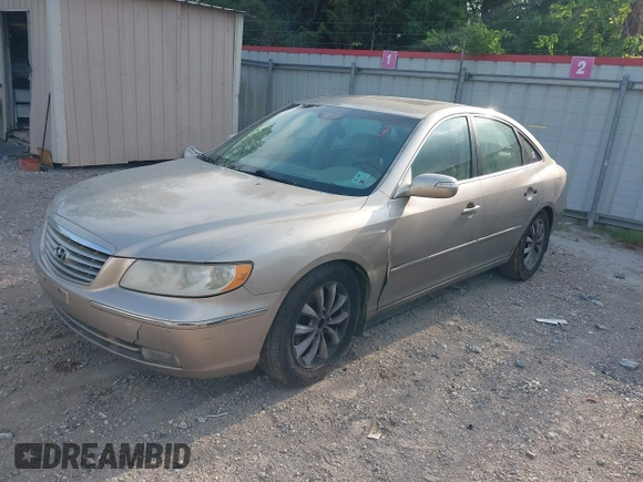 2007 Hyundai Azera SE z VIN KMHFC46F67A162638, wystawiony jako IAAI lot #42053153 z przebiegiem 130 133 mil mil oraz . Historia ofert i sprzedaży dostępna na DreamBid. Obrazek 2.