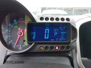 2013 Chevrolet Sonic LT with VIN 1G1JC6SHXD4139822, listed as a IAAI auction lot 41672289 with 87,899 mi miles. Bid and sale history available at carsss.com. Image 7.