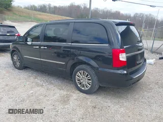 2015 Chrysler Town & Country Touring L with VIN 2C4RC1CG8FR522404, listed as a IAAI auction lot 41932426 with 165,092 mi miles and . Bid and sale history available at DreamBid. Image 3.