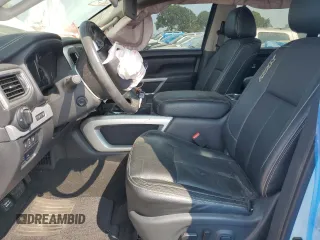 2018 Nissan Titan Platinum Reserve with VIN 1N6BA1F49JN521225, listed as a Copart auction lot 69831004 with 92,536 mi miles and Salvage title. Bid and sale history available at DreamBid. Image 7.