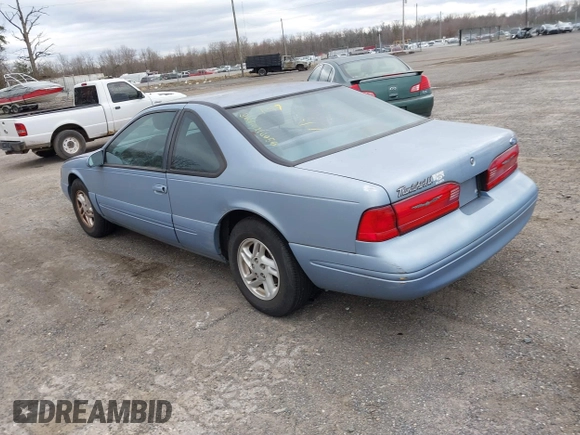 1997 Ford Thunderbird LX z VIN 1FALP62W2VH105702, wystawiony jako IAAI lot #41713980 z przebiegiem 90 775 mil mil oraz . Historia ofert i sprzedaży dostępna na DreamBid. Obrazek 3.