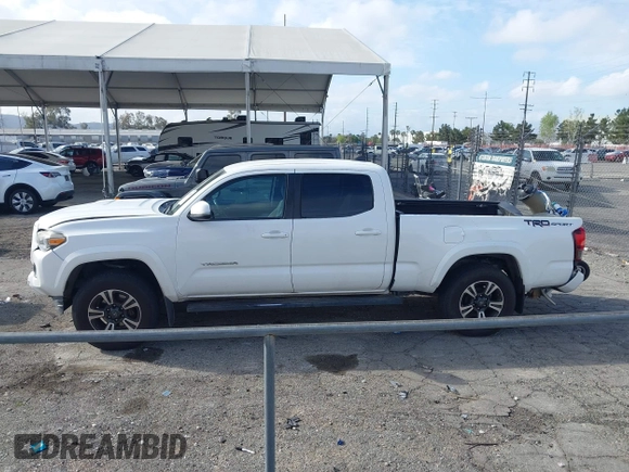 2018 Toyota Tacoma SR5 with VIN 3TMBZ5DN7JM016650, listed as a IAAI auction lot 41903835 with 105,123 mi miles and . Bid and sale history available at DreamBid. Image 15.