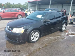 2013 Dodge Avenger SXT with VIN 1C3CDZCG1DN526424, listed as a IAAI auction lot 42379940 with 151,231 mi miles and . Bid and sale history available at DreamBid. Image 2.