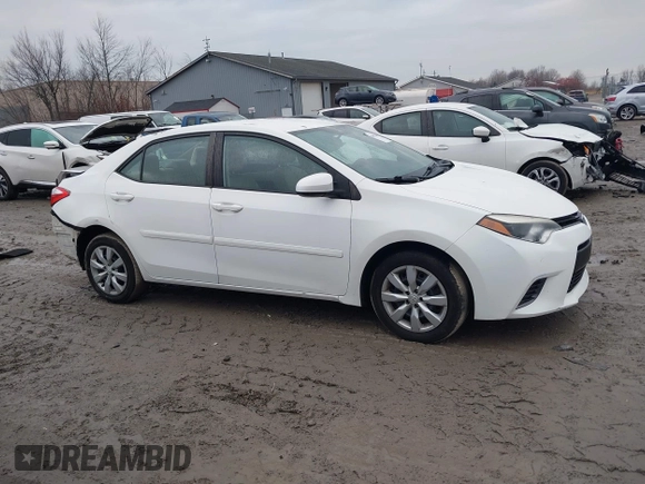2015 Toyota Corolla L with VIN 5YFBURHE4FP330420, listed as a IAAI auction lot 41059296 with 73,689 mi miles and . Bid and sale history available at DreamBid. Image 14.