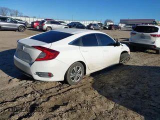 2017 Honda Civic LX z VIN 19XFC2F50HE007646, wystawiony jako IAAI lot #41360121 z przebiegiem 133 800 mil mil oraz . Historia ofert i sprzedaży dostępna na DreamBid. Obrazek 4.