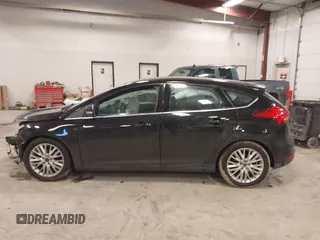 2017 Ford Focus Titanium with VIN 1FADP3N25HL222297, listed as a IAAI auction lot 41698707 with 121,756 mi miles and . Bid and sale history available at carsss.com. Image 14.