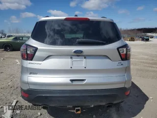 2017 Ford Escape SE with VIN 1FMCU9GD2HUC63427, listed as a Copart auction lot 50571535 with 102,911 mi miles and Salvage Title. Bid and sale history available at carsss.com. Image 6.