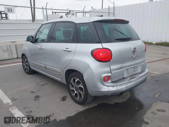 2014 FIAT 500L Lounge with VIN ZFBCFACH8EZ005035, listed as a IAAI auction lot 41824368 with 80,914 mi miles and . Bid and sale history available at DreamBid. Image 3.