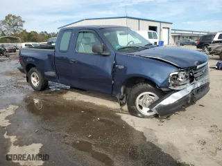 2003 Ford F-150 XL with VIN 1FTRX07273KB66549, listed as a Copart auction lot 83552004 with 205,026 mi miles and Salvage Title. Bid and sale history available at carsss.com. Image 4.