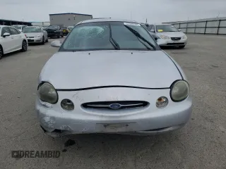 1999 Ford Taurus SE with VIN 1FAFP53U9XG290036, listed as a Copart auction lot 53505065 with 200,149 mi miles and Salvage title. Bid and sale history available at DreamBid. Image 5.
