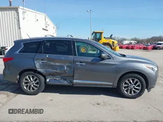 2015 Infiniti QX60 with VIN 5N1AL0MM4FC536249, listed as a IAAI auction lot 41964281 with 148,851 mi miles and . Bid and sale history available at DreamBid. Image 14.