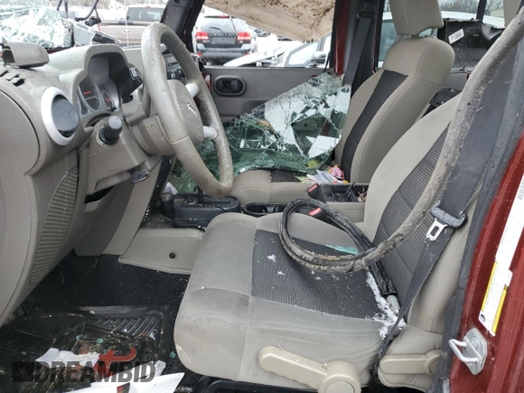 2010 Jeep Wrangler Unlimited Sahara with VIN 1J4BA5H10AL103638, listed as a Copart auction lot 48119645 with 0 mi miles and Salvage Title. Bid and sale history available at carsss.com. Image 7.