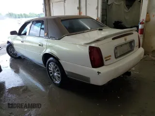 2004 Cadillac DeVille z VIN 1G6KD54Y44U229535, wystawiony jako Copart lot #57307835 z przebiegiem Nie podano mil oraz Szkoda całkowita • Salvage title. Historia ofert i sprzedaży dostępna na DreamBid. Obrazek 2.