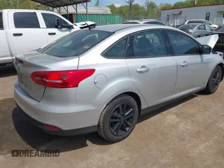 2016 Ford Focus SE with VIN 1FADP3F23GL373801, listed as a IAAI auction lot 42083360 with 52,993 mi miles and . Bid and sale history available at DreamBid. Image 4.
