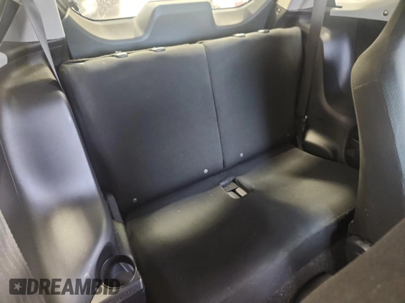 2012 Scion iQ z VIN JTNJJXB04CJ012587, wystawiony jako Copart lot #58191845 z przebiegiem 104 601 mil mil oraz Szkoda całkowita • Salvage title. Historia ofert i sprzedaży dostępna na DreamBid. Obrazek 10.