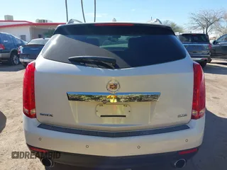2013 Cadillac SRX Performance Collection with VIN 3GYFNDE37DS599557, listed as a IAAI auction lot 41633569 with 100,611 mi miles and . Bid and sale history available at DreamBid. Image 16.