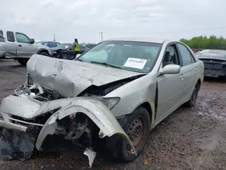 2003 Toyota Camry LE with VIN 4T1BE32K63U755835, listed as a IAAI auction lot 41976402 with 215,788 mi miles and . Bid and sale history available at DreamBid. Image 2.