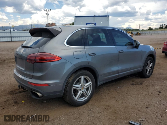 2016 Porsche Cayenne z VIN WP1AA2A21GKA10062, wystawiony jako Copart lot #64639685 z przebiegiem 52 962 mil mil oraz Szkoda całkowita • Salvage title. Historia ofert i sprzedaży dostępna na DreamBid. Obrazek 3.