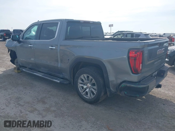 2021 GMC Sierra 1500 Denali z VIN 3GTU9FETXMG382438, wystawiony jako IAAI lot #41880365 z przebiegiem 54 651 mil mil oraz . Historia ofert i sprzedaży dostępna na DreamBid. Obrazek 3.