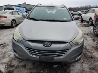 2010 Hyundai Tucson GLS with VIN KM8JU3AC2AU113747, listed as a Copart auction lot 48031375 with 220,982 mi miles and Salvage Title. Bid and sale history available at DreamBid. Image 5.