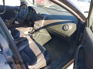 2005 Pontiac G6 GT with VIN 1G2ZH528354169479, listed as a IAAI auction lot 41430508 with 241,576 mi miles. Bid and sale history available at carsss.com. Image 5.