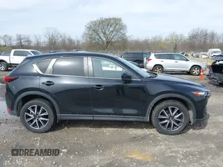 2018 Mazda CX-5 Touring with VIN JM3KFBCMXJ0438177, listed as a IAAI auction lot 42152275 with 65,434 mi miles and . Bid and sale history available at carsss.com. Image 13.