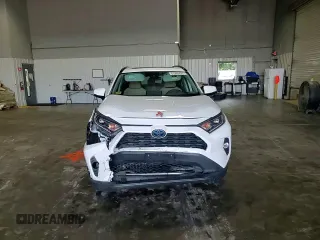 2019 Toyota RAV4 Hybrid XLE with VIN 2T3RWRFV1KW016526, listed as a Copart auction lot 61466435 with 64,255 mi miles and Salvage title. Bid and sale history available at DreamBid. Image 14.