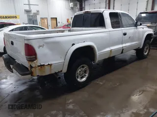 1998 Dodge Dakota SLT with VIN 1B7GG22Y1WS637629, listed as a IAAI auction lot 41781675 with 181,590 mi miles. Bid and sale history available at carsss.com. Image 4.