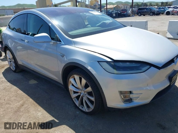 2016 Tesla Model X P90D with VIN 5YJXCAE49GF001067, listed as a IAAI auction lot 41980455 with 94,746 mi miles. Bid and sale history available at carsss.com. Image 1.