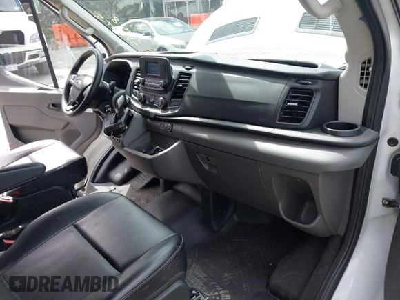 2020 Ford Transit Passenger XL z VIN 1FDZK1C82LKA79233, wystawiony jako IAAI lot #42766871 z przebiegiem 32 428 mil mil oraz . Historia ofert i sprzedaży dostępna na DreamBid. Obrazek 5.