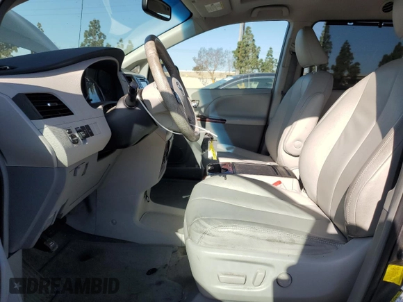 2013 Toyota Sienna XLE AAS with VIN 5TDYK3DC8DS323329, listed as a Copart auction lot 51957005 with 157,638 mi miles and Salvage title. Bid and sale history available at DreamBid. Image 7.
