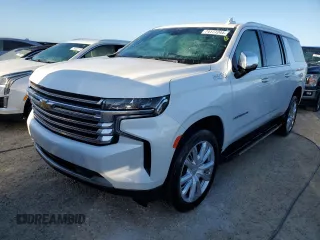 2022 Chevrolet Suburban High Country with VIN 1GNSKGKL3NR233657, listed as a Copart auction lot 74177244 with 9,111 mi miles and Salvage Title. Bid and sale history available at DreamBid. Image 1.