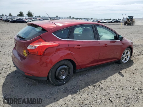 2014 Ford Focus Titanium with VIN 1FADP3N21EL421469, listed as a Copart auction lot 59744685 with 68,436 mi miles and Salvage title. Bid and sale history available at DreamBid. Image 3.
