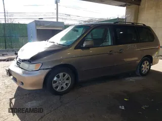 2004 Honda Odyssey EX-RES z VIN 5FNRL18874B127785, wystawiony jako IAAI lot #41141221 z przebiegiem 151 036 mil mil oraz . Historia ofert i sprzedaży dostępna na DreamBid. Obrazek 2.