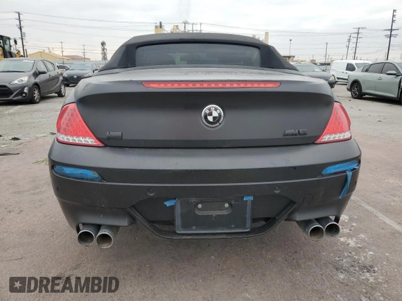 2009 BMW 6 Series M6 z VIN WBSEK935X9CY80091, wystawiony jako Copart lot #43348935 z przebiegiem 128 438 mil mil oraz Tytuł czysty. Historia ofert i sprzedaży dostępna na DreamBid. Obrazek 6.