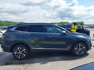 2023 Kia Sportage EX with VIN KNDPVCAG2P7046184, listed as a IAAI auction lot 42212231 with 25,212 mi miles and . Bid and sale history available at DreamBid. Image 13.