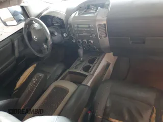 2004 Nissan Titan SE with VIN 1N6AA06B84N577326, listed as a Copart auction lot 59724355 with 179,549 mi miles and Salvage title. Bid and sale history available at DreamBid. Image 8.
