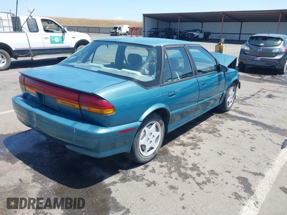 1995 Saturn SL with VIN 1G8ZK5275SZ303745, listed as a IAAI auction lot 42280801 with 137,719 mi miles and . Bid and sale history available at DreamBid. Image 4.